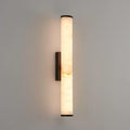 Vertical alabaster column wall sconce with translucent shade and metal trim