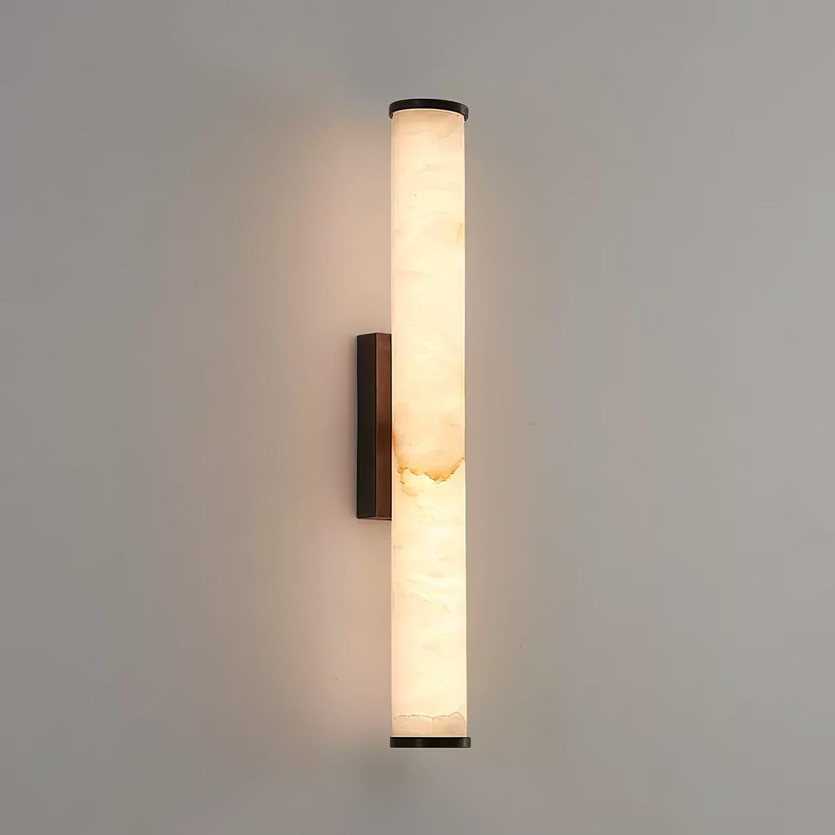 Vertical alabaster column wall sconce with translucent shade and metal trim
