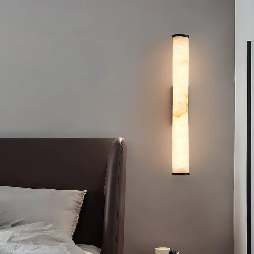 Vertical alabaster column wall sconce with translucent shade and metal trim
