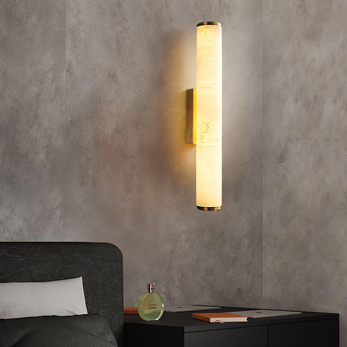 Vertical alabaster column wall sconce with translucent shade and metal trim