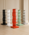 Vertical metal bookshelf with open shelves and a rectangular base