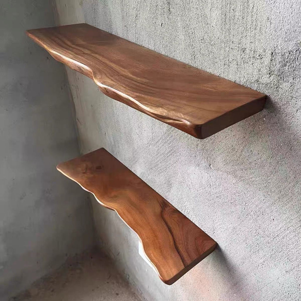 Brown hardwood wall shelf with a naturally shaped live edge