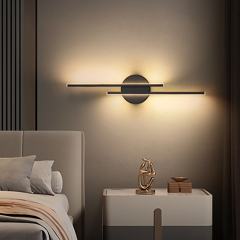 Minimalist metal wall sconce with round backplate and vertical bars