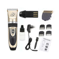Black and gold cordless pet hair clipper with four guide combs and grooming accessories