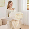Soft plush throw blanket with wide raised ribbed texture