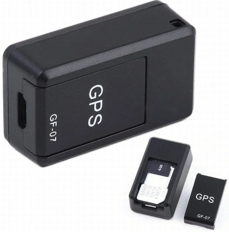 Black GF-07 mini GPS tracker beside a smartphone showing a map