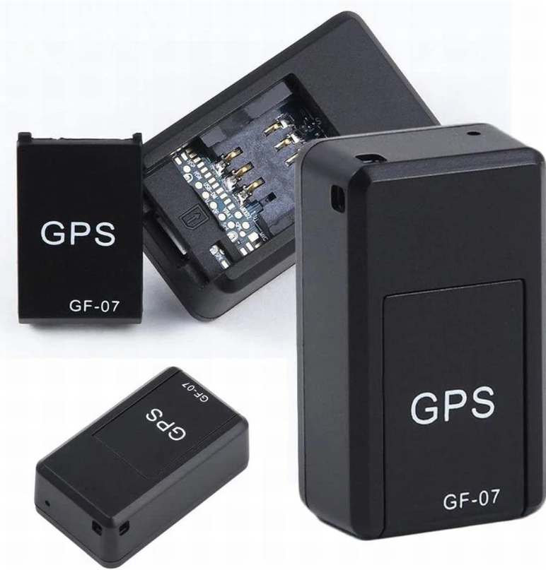Black GF-07 mini GPS tracker beside a smartphone showing a map
