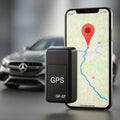 Black GF-07 mini GPS tracker beside a smartphone showing a map