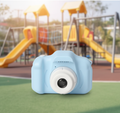 Rugged children's digital camera with large front lens