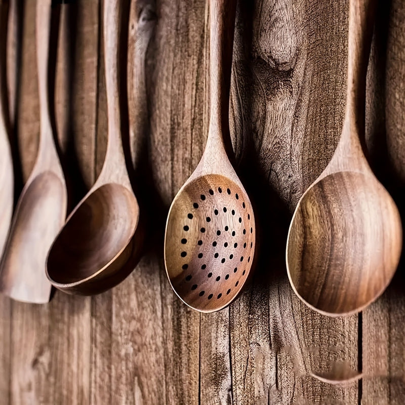 Five-piece brown wooden kitchen utensil set with spoons and spatulas