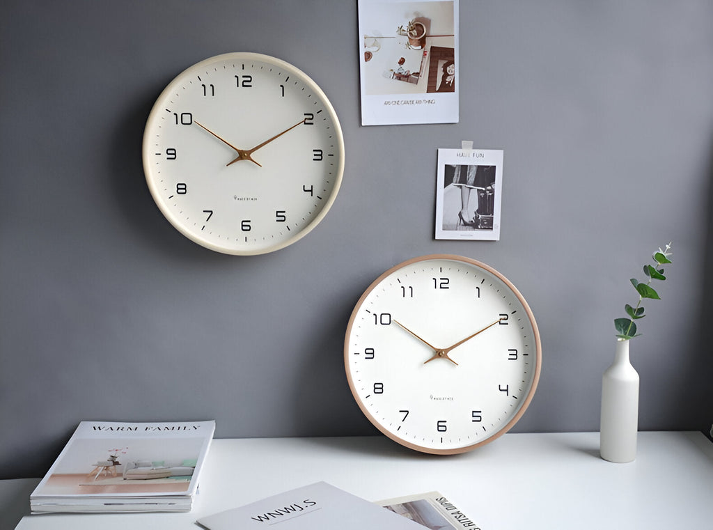 Round analogue wall clock with light dial and wood-effect frame