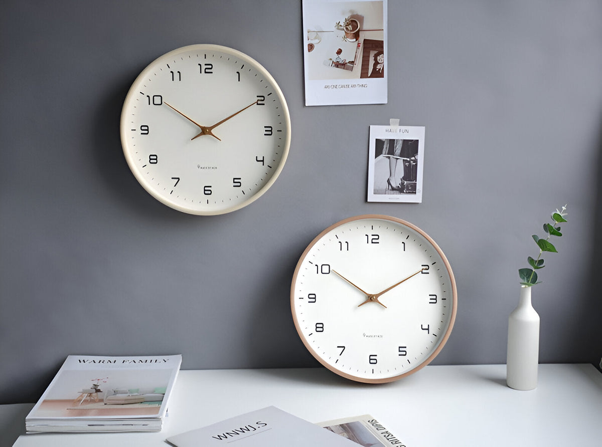 Round analogue wall clock with light dial and wood-effect frame