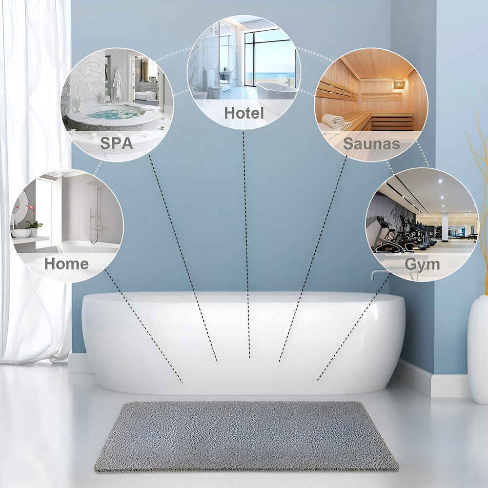 Textured rectangular bath mat with rounded corners on a bathroom floor