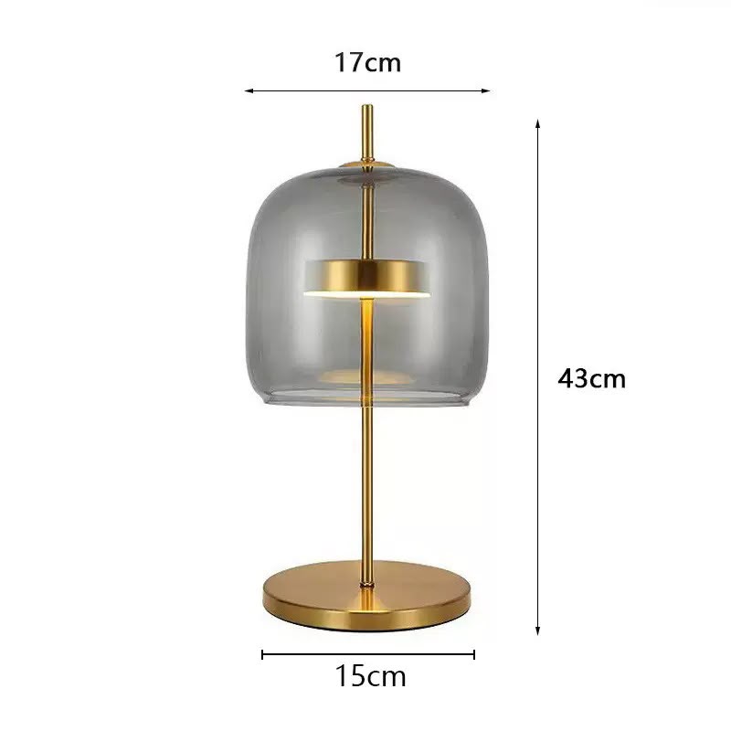 Table lamp with rounded tinted glass shade, central stem and circular base