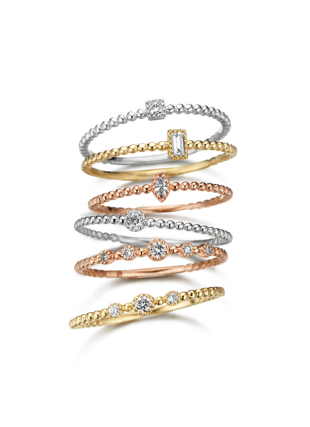 Yellow gold ring with beaded band and three diamond-set accents