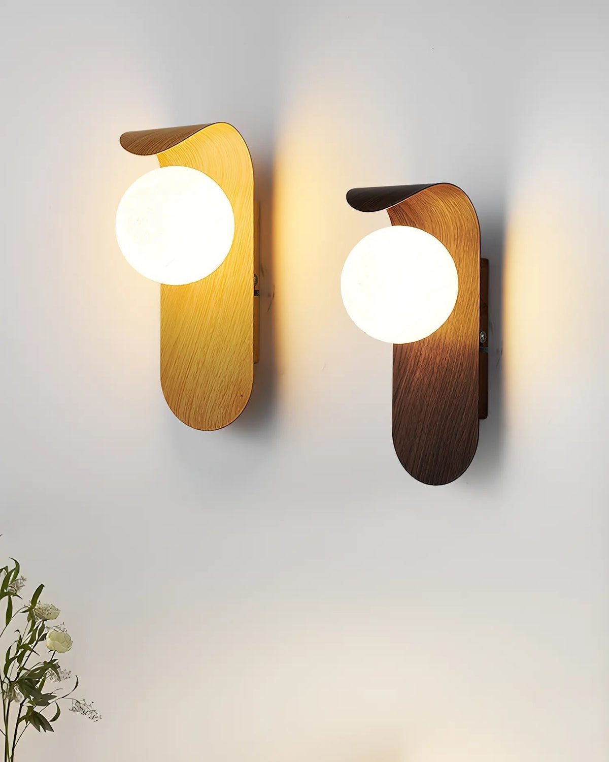 Japandi LED wall light with round globe shade and curved wood-effect panel