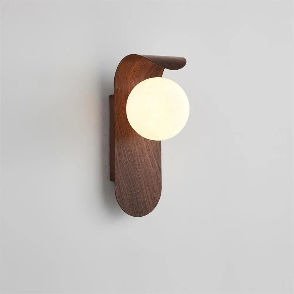 Japandi LED wall light with round globe shade and curved wood-effect panel