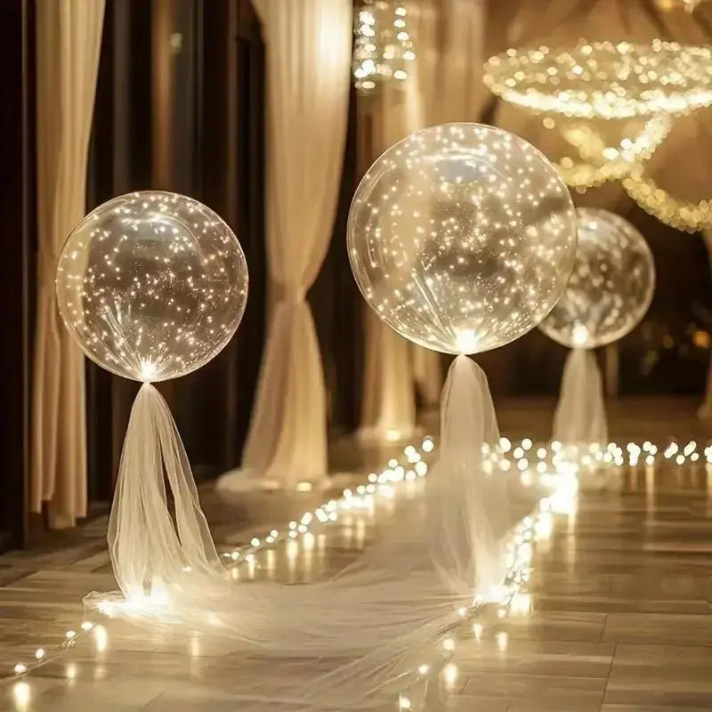 Clear balloon-style party lights with warm white light points
