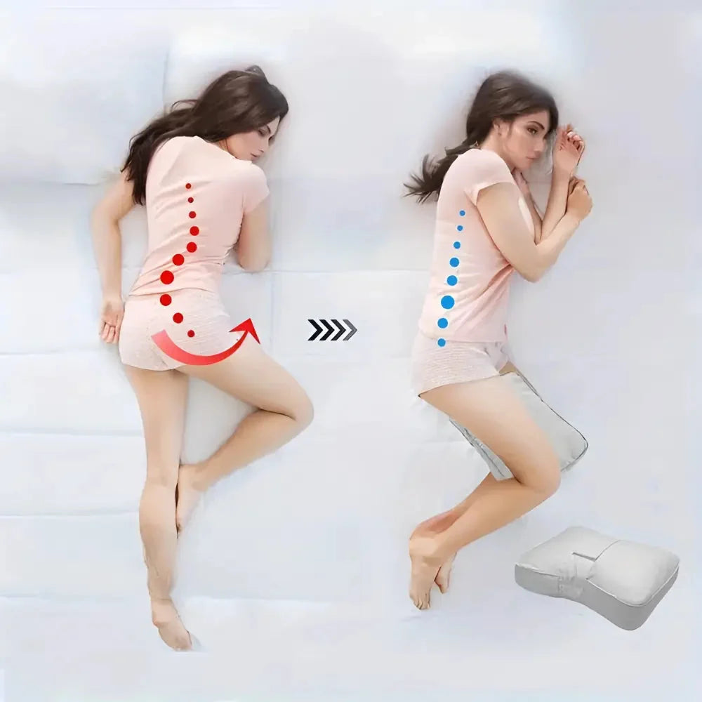Contoured knee pillow with securing strap positioned between the legs