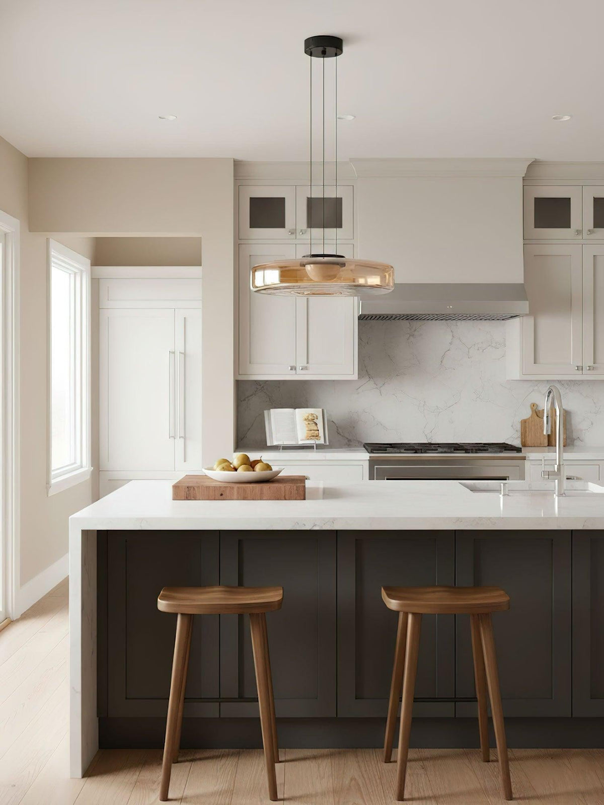 Rounded glass pendant light suspended from a black ceiling canopy
