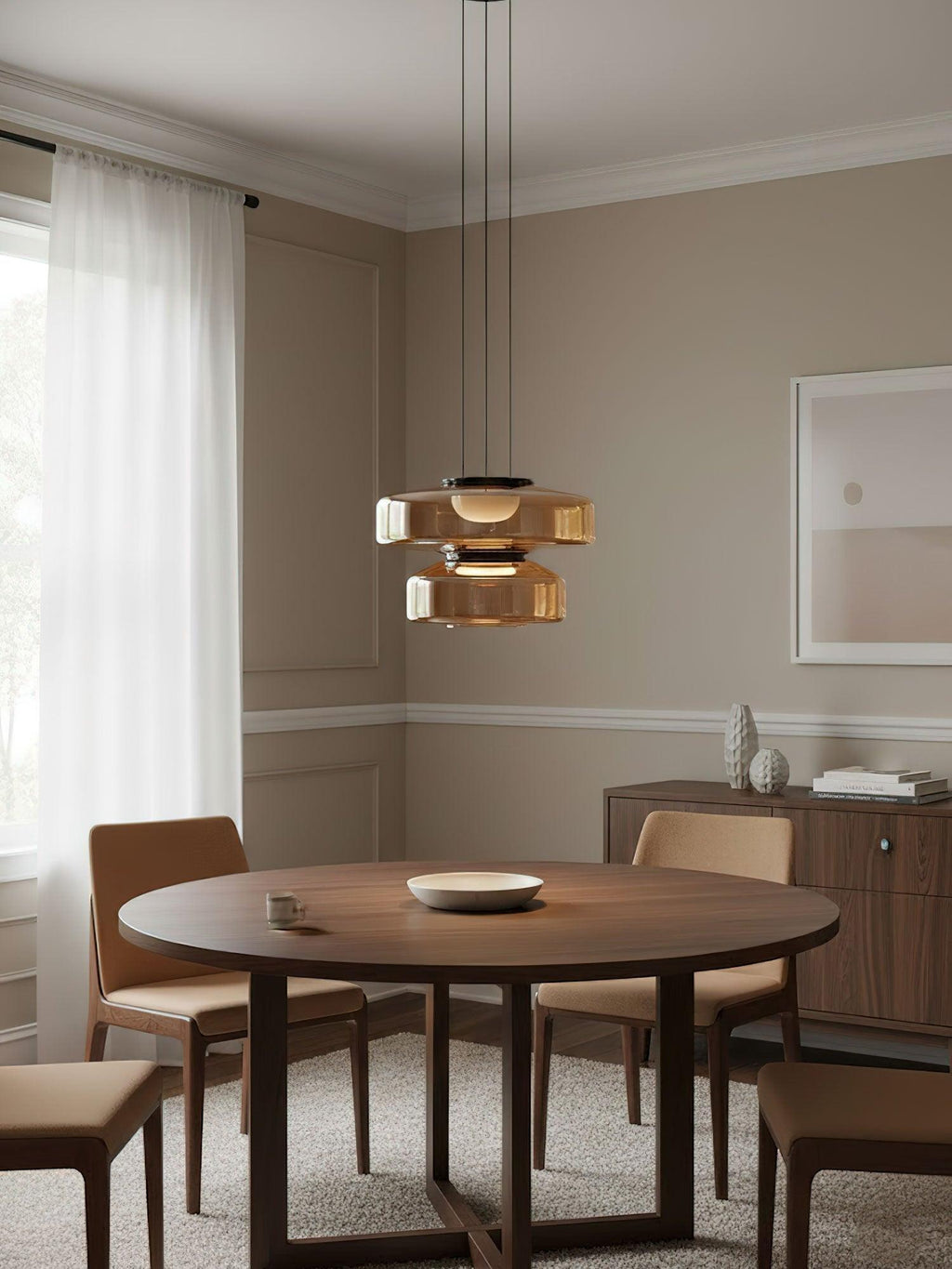 Rounded glass pendant light suspended from a black ceiling canopy