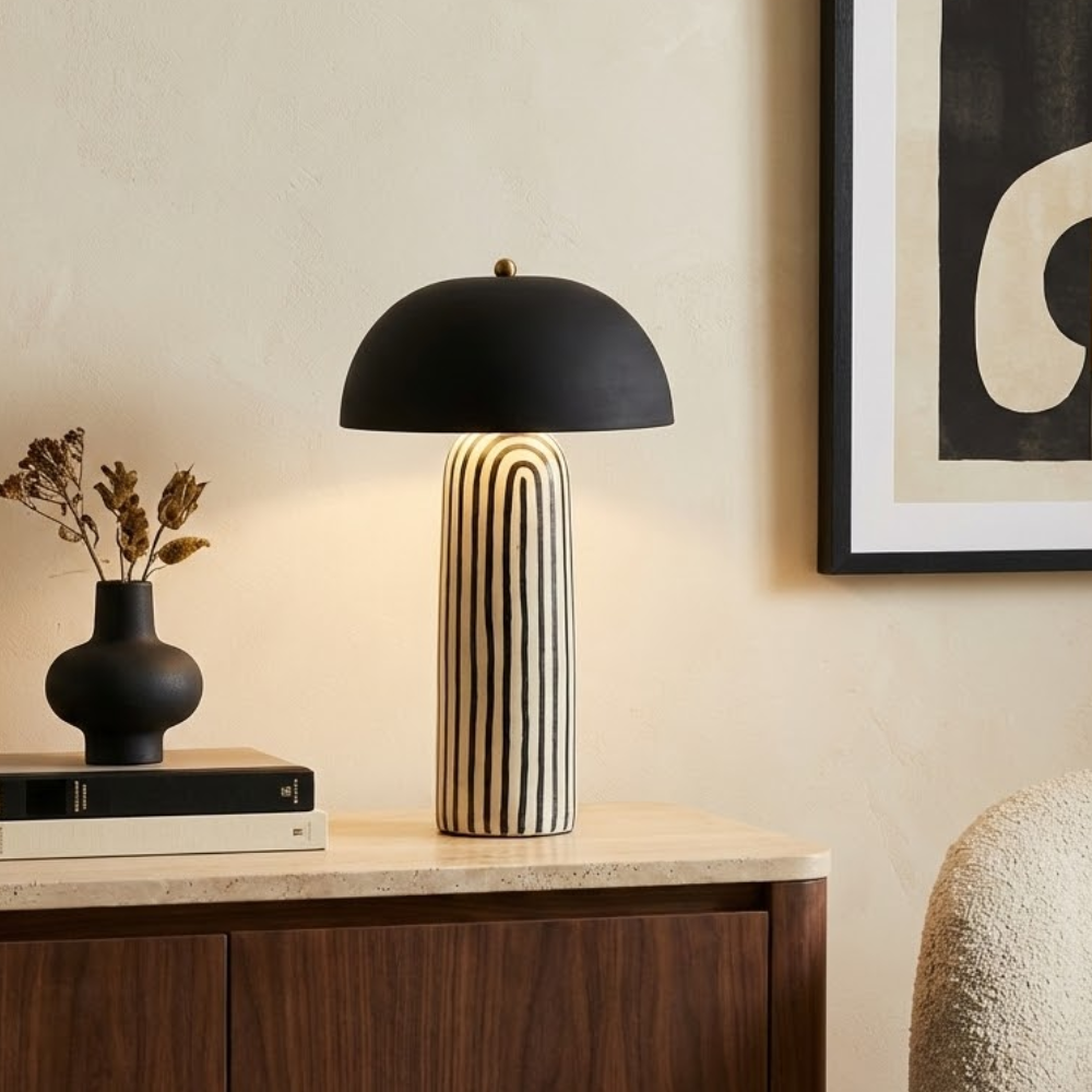 Striped ceramic table lamp with a dome shade