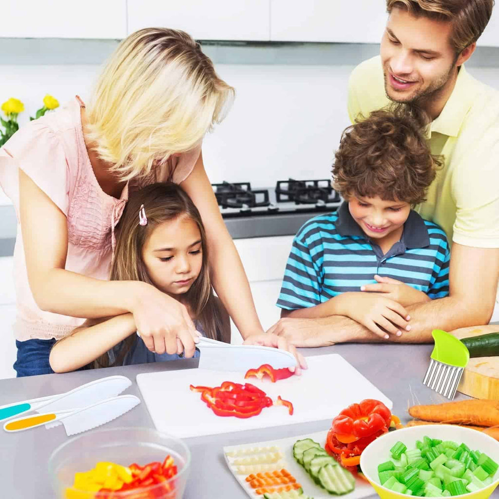 13-piece children's kitchen knife set with colourful tools and cutting boards