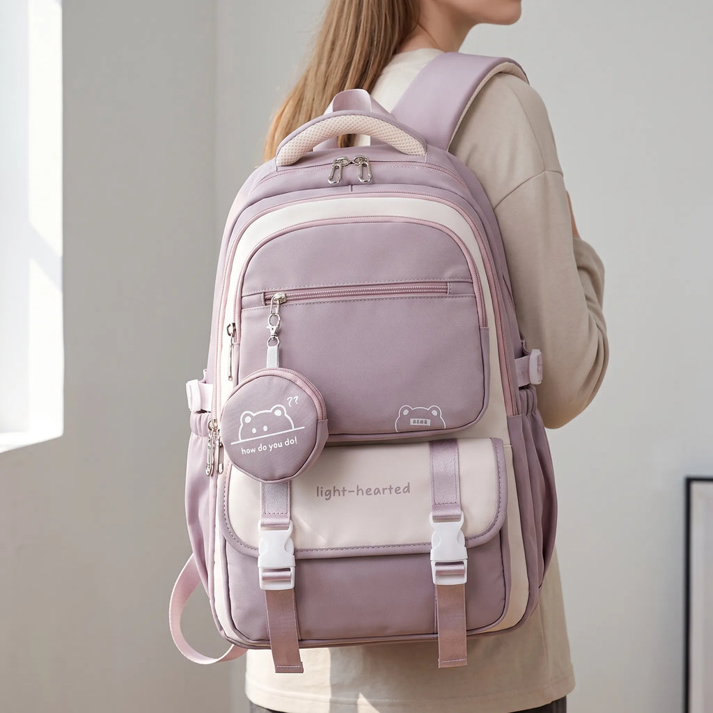 Multi-pocket school backpack with front pouch and adjustable shoulder straps