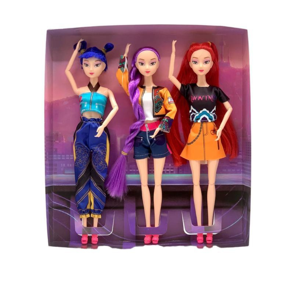 Three fashion dolls with colourful outfits and accessories in a purple display box