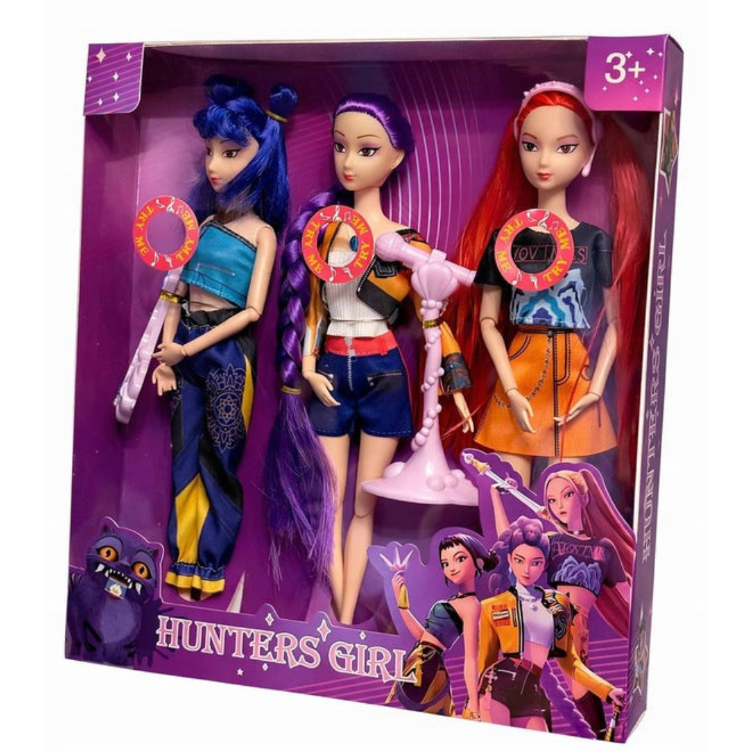 Three fashion dolls with colourful outfits and accessories in a purple display box
