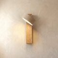 Adjustable travertine-effect wall light with angled shade and wood-effect backplate
