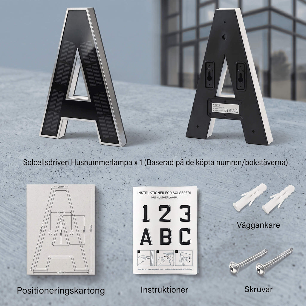 Black solar-powered illuminated house letter lamp with warm white outline