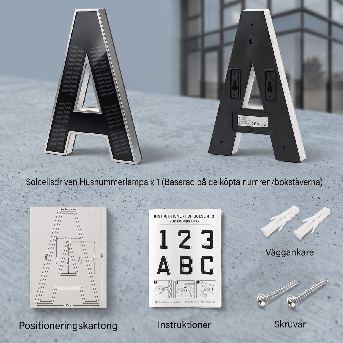 Black solar-powered illuminated house letter lamp with warm white outline