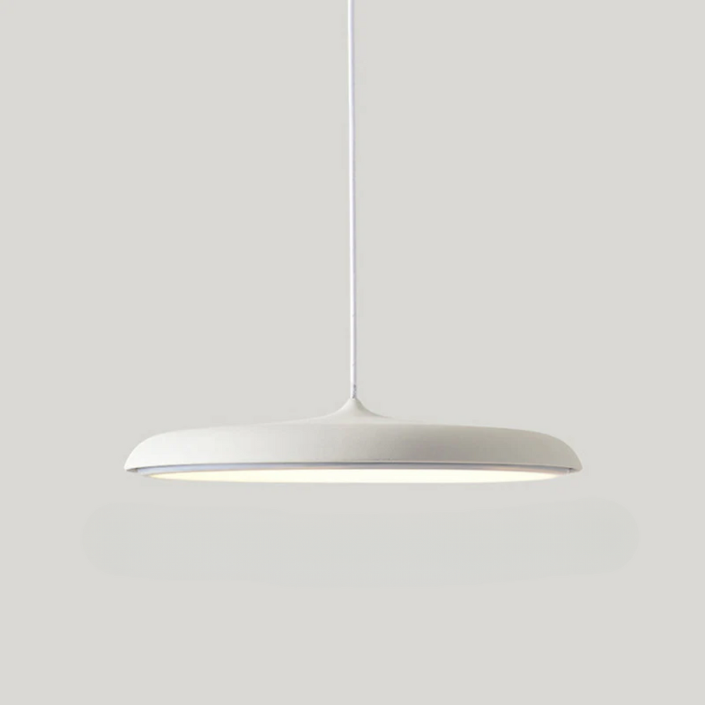 Scandinavian pendant ceiling light with a slim disc shade and suspended cord