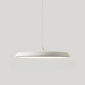 Scandinavian pendant ceiling light with a slim disc shade and suspended cord
