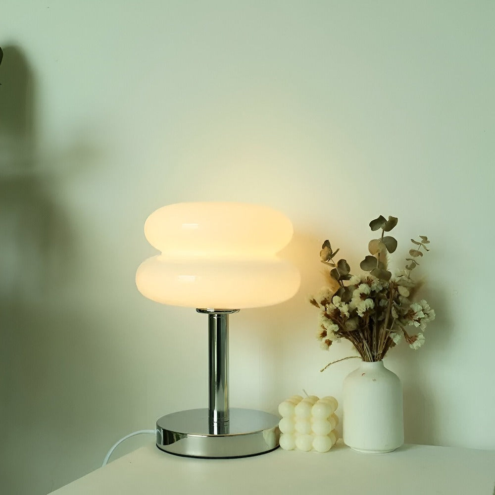 Glass table lamp with two-tier rounded shade and chrome-effect stand