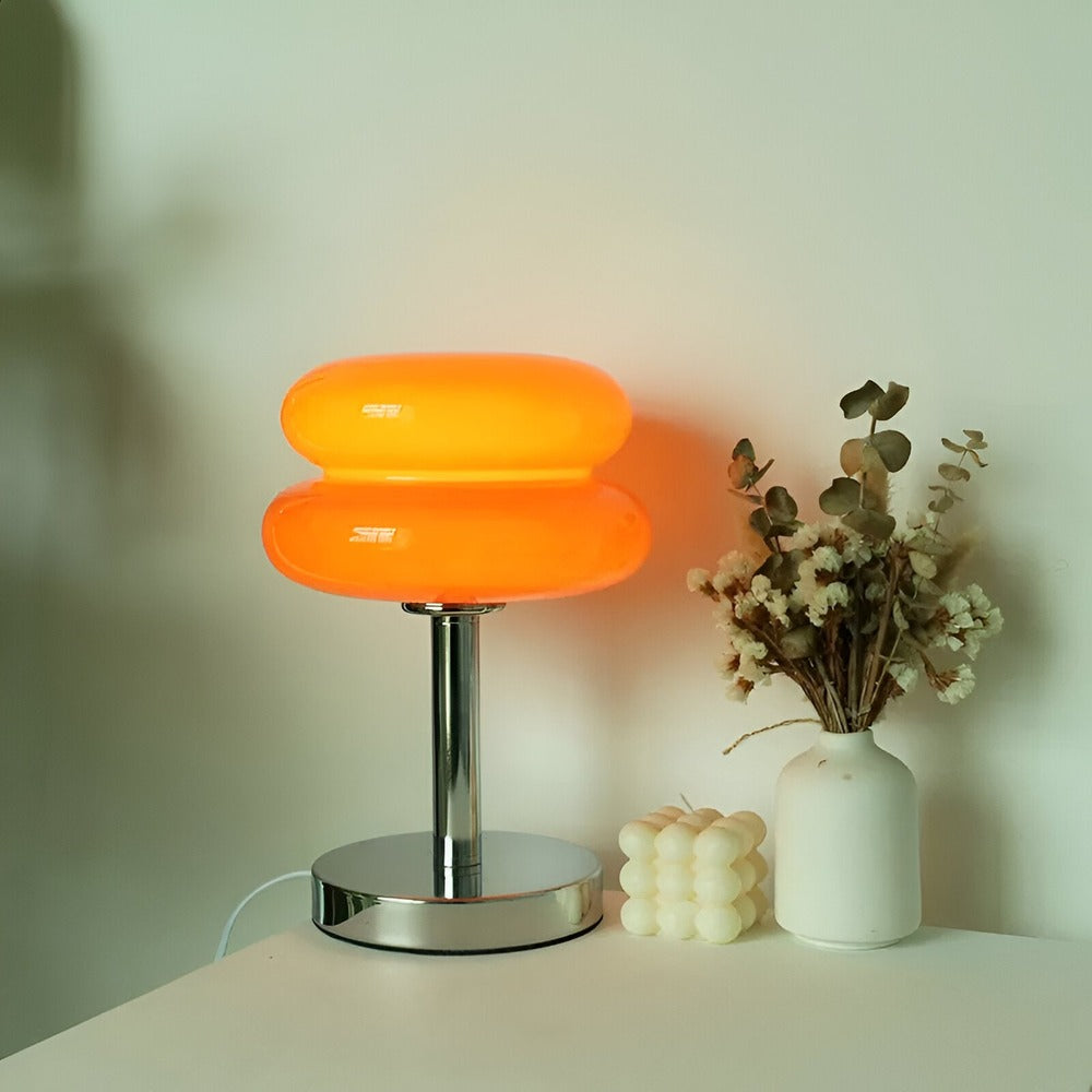 Glass table lamp with two-tier rounded shade and chrome-effect stand