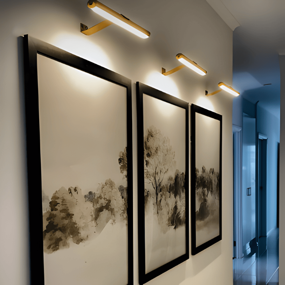 Cordless rotatable LED picture light mounted above framed artwork
