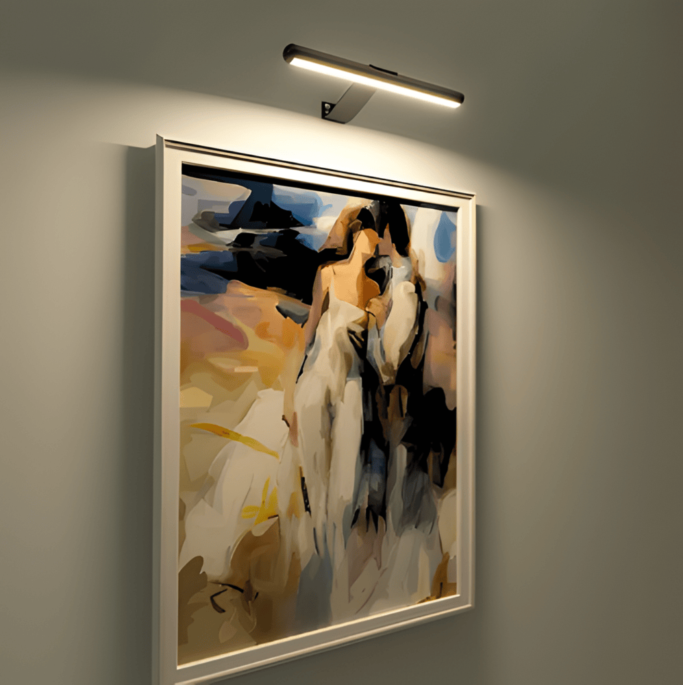 Cordless rotatable LED picture light mounted above framed artwork