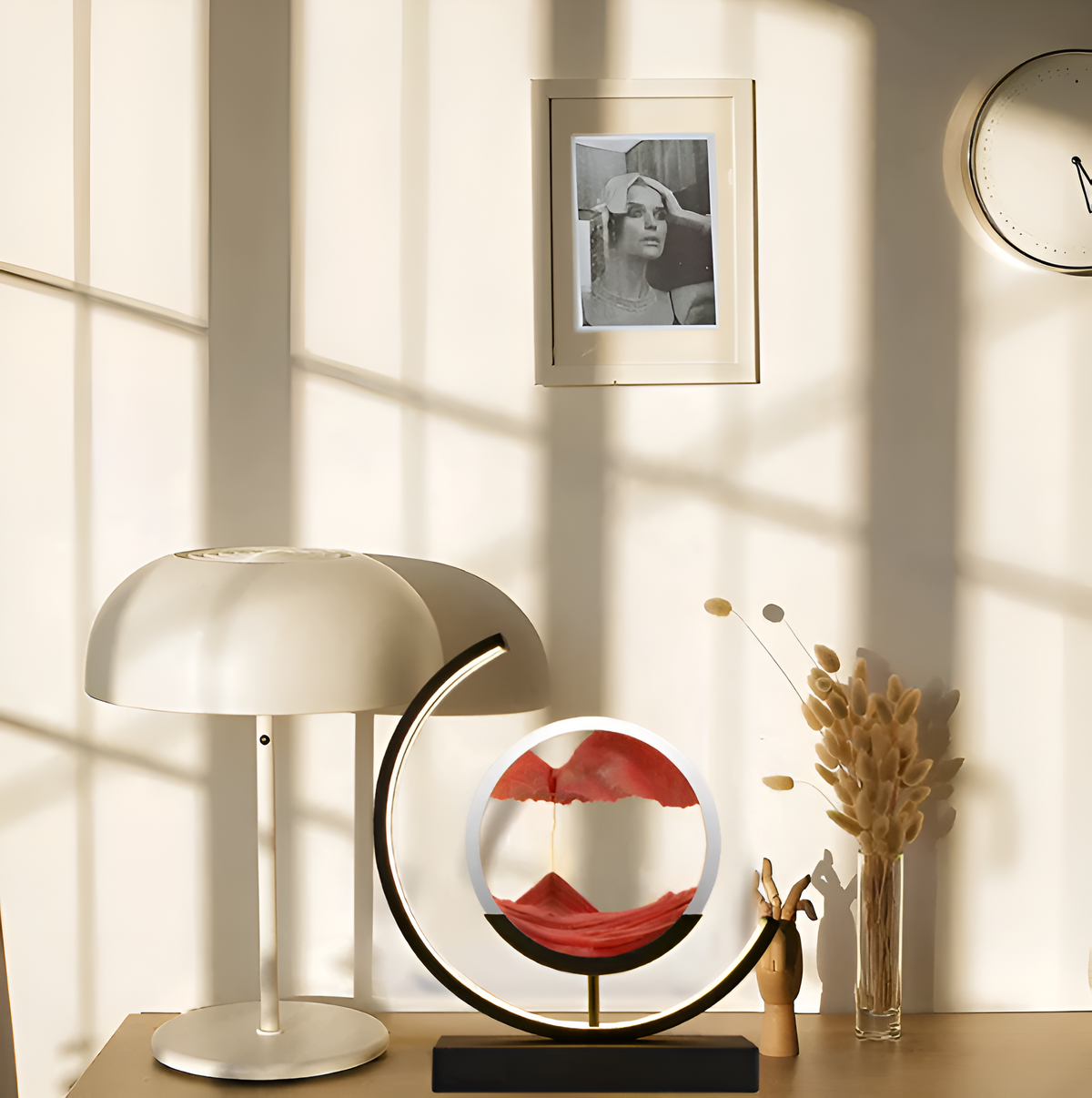 Decorative sand art table lamp with circular illuminated frame and rectangular base
