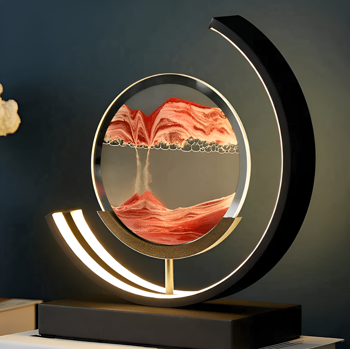 Decorative sand art table lamp with circular illuminated frame and rectangular base