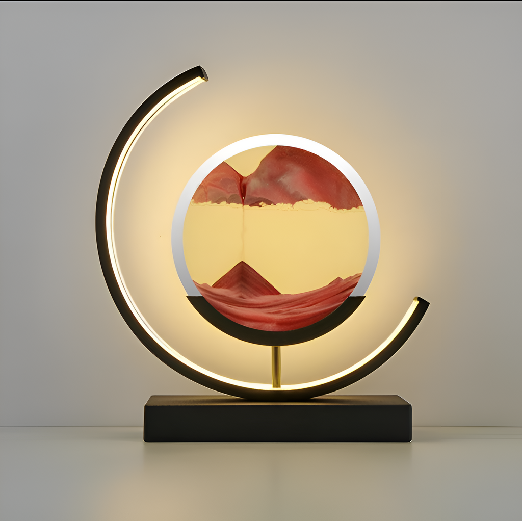 Decorative sand art table lamp with circular illuminated frame and rectangular base