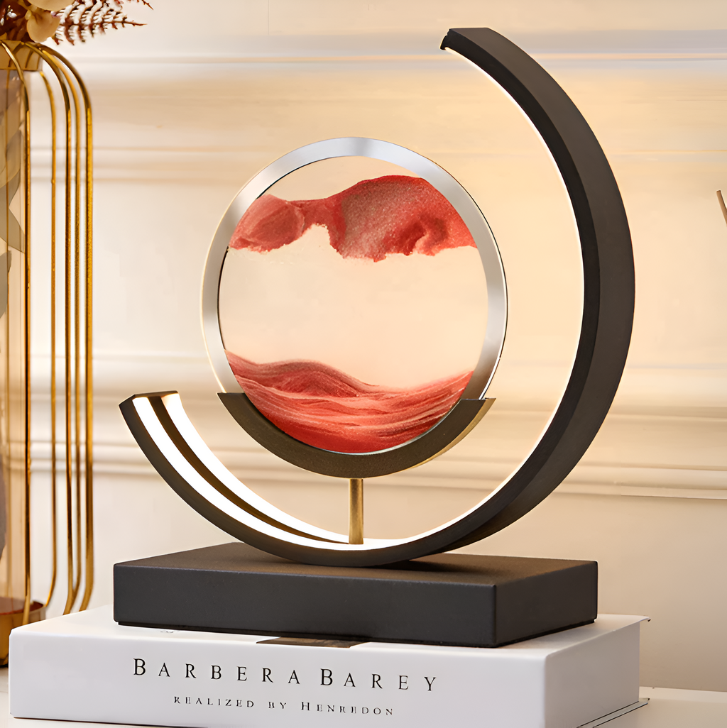 Decorative sand art table lamp with circular illuminated frame and rectangular base