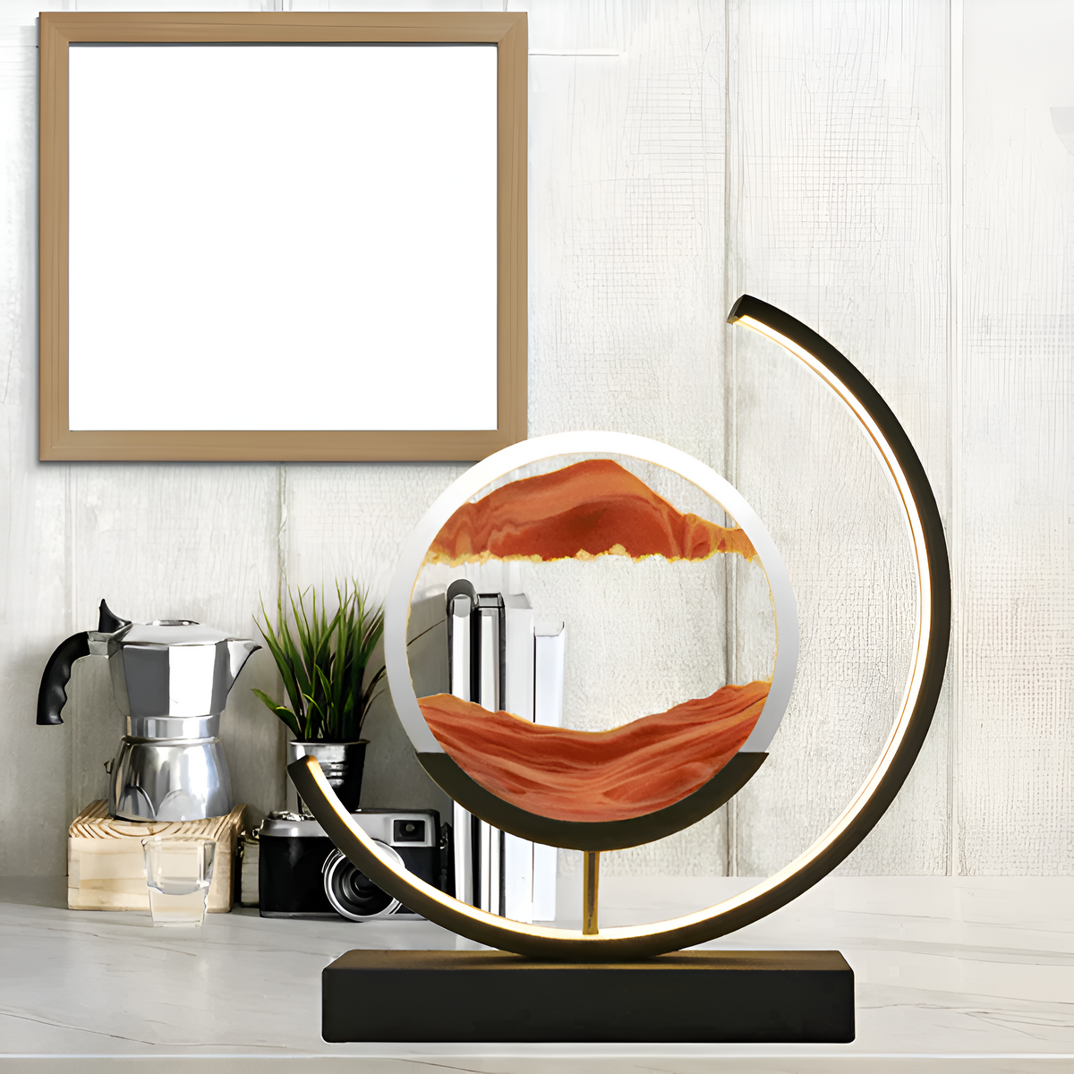 Decorative sand art table lamp with circular illuminated frame and rectangular base