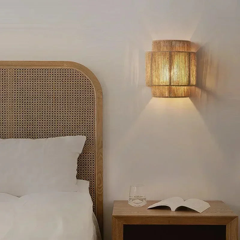 Brown woven rattan wall lamp with layered cylindrical shade
