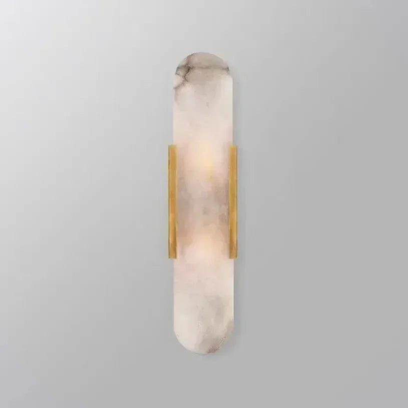 Vertical LED wall sconce with a light marble panel and contrasting side rails