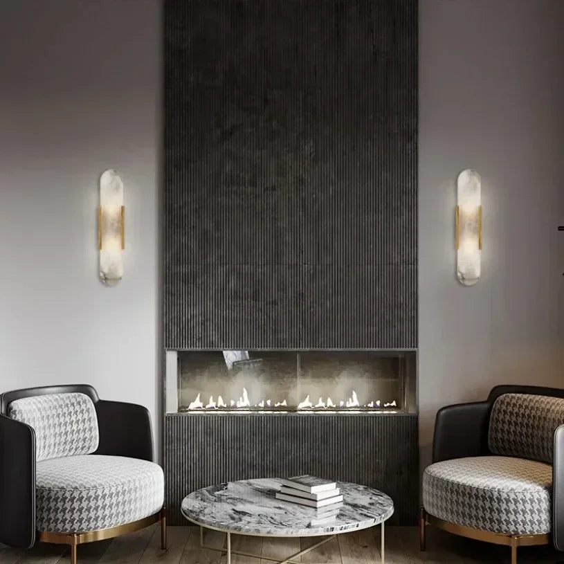 Vertical LED wall sconce with a light marble panel and contrasting side rails