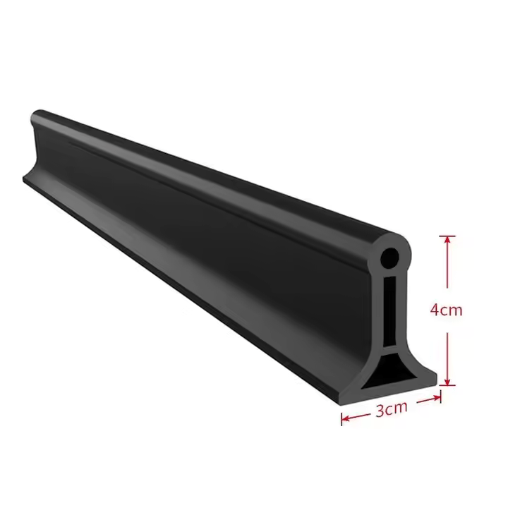 Shaped shower seal strip for bathroom leak prevention