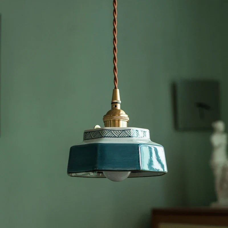 Geometric pendant lamp with patterned shade, copper-tone fitting and braided cord