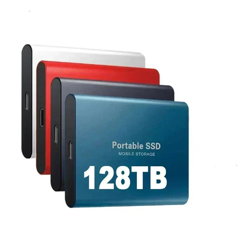 Portable SSD external drive with USB cable beside a laptop